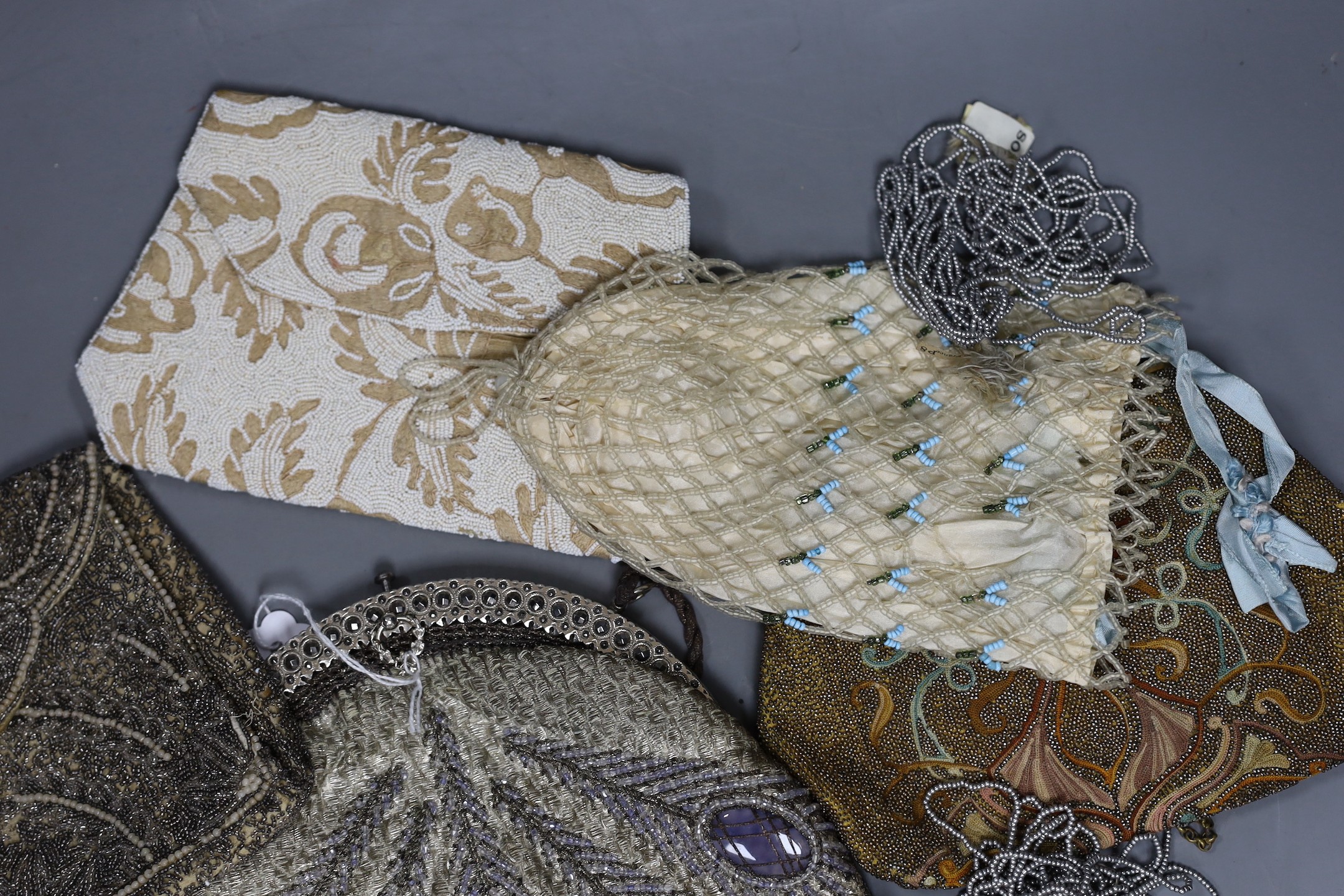 Nine mixed late 19th century to mid 20th century multicoloured bead worked and embroidered evening bags